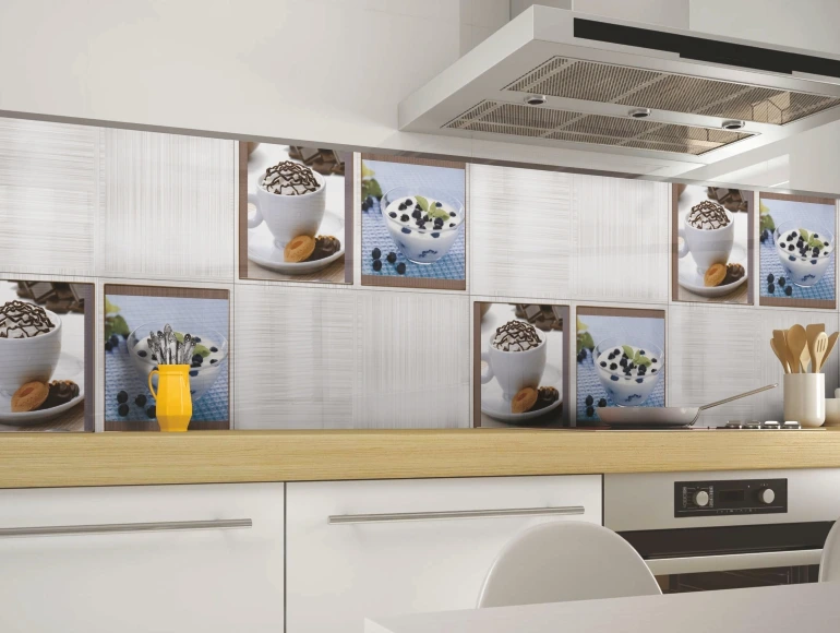 Kitchen backsplash design with coffee-themed decorative tiles.